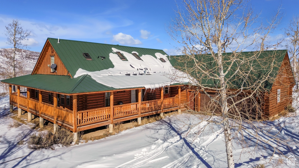 View of snow covered property