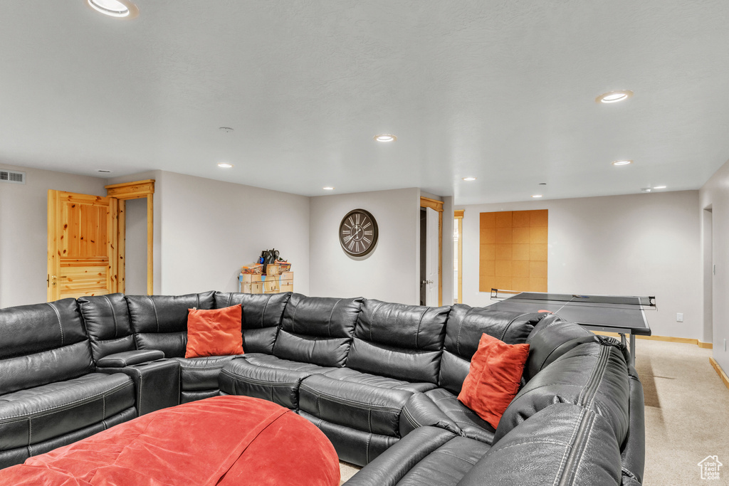 Living room featuring light carpet