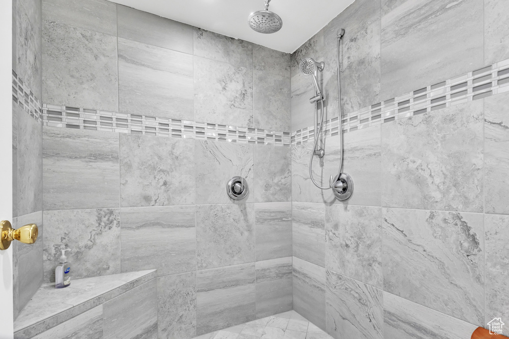 Bathroom with a tile shower