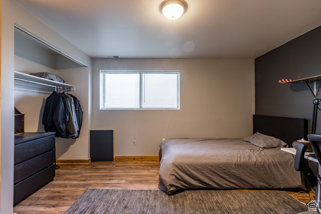 Bedroom featuring hardwood / wood-style floors