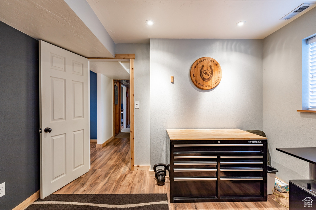 Hall featuring wood-type flooring