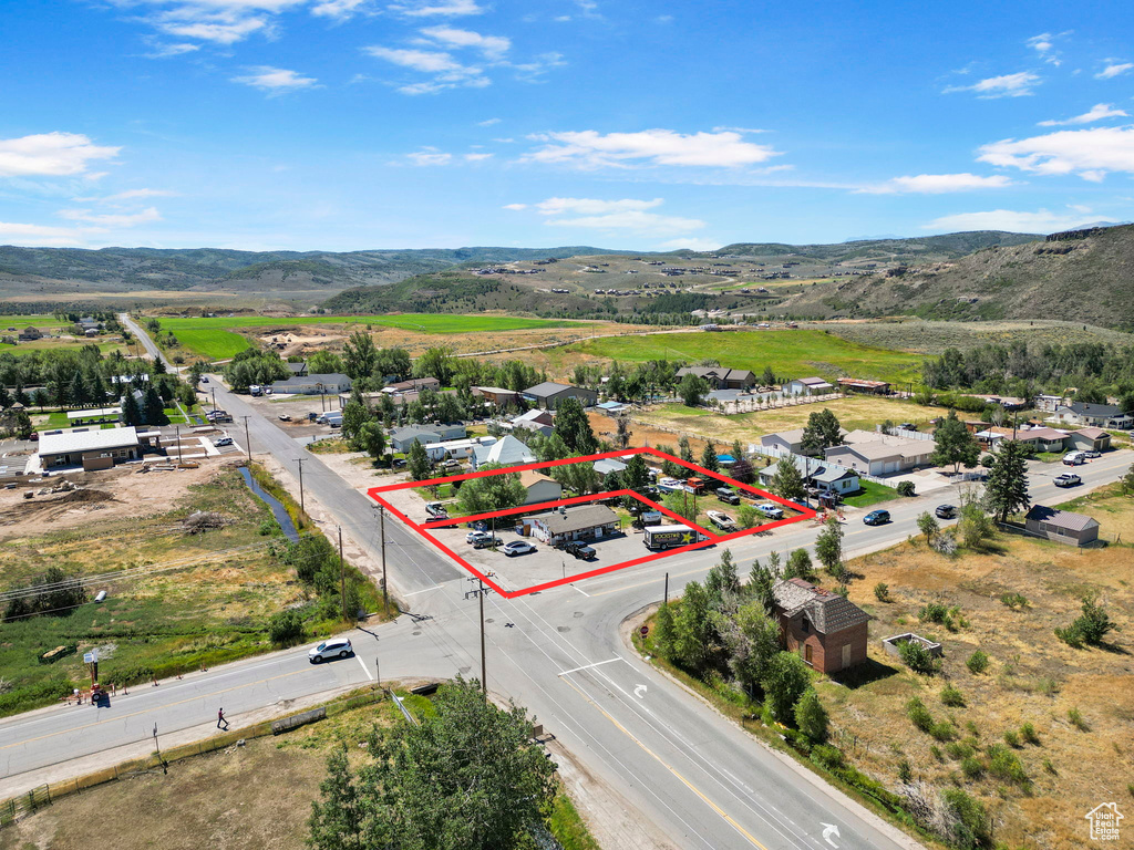 Birds eye view of property featuring a mountain view