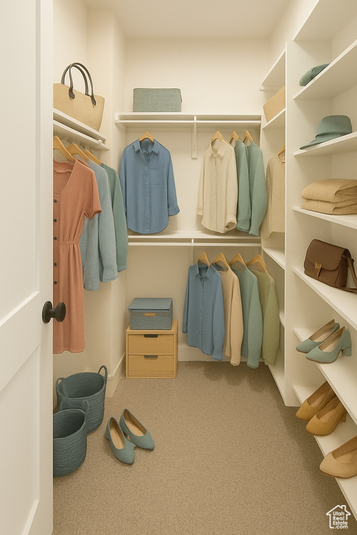 Walk in closet featuring carpet