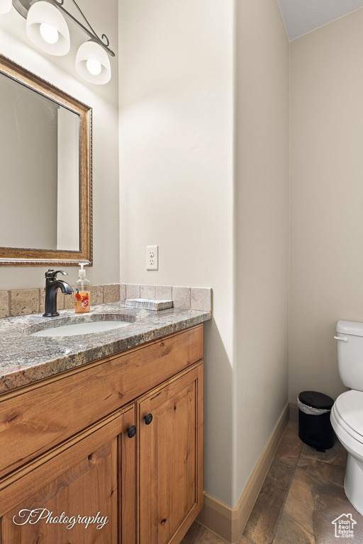 Bathroom with vanity and toilet