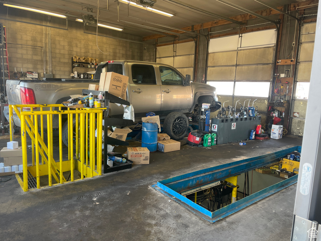 Garage featuring a garage door opener