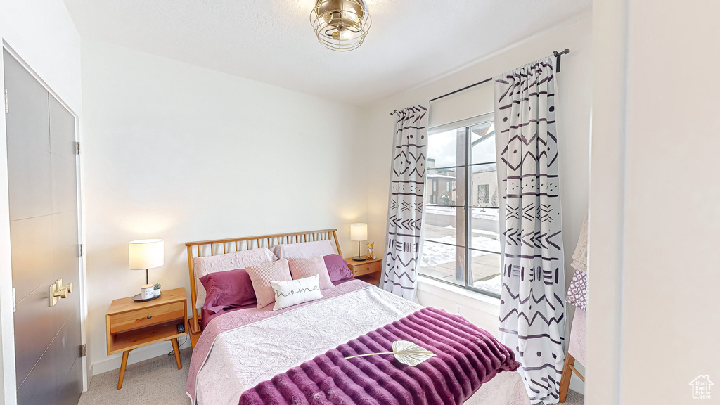 View of carpeted bedroom