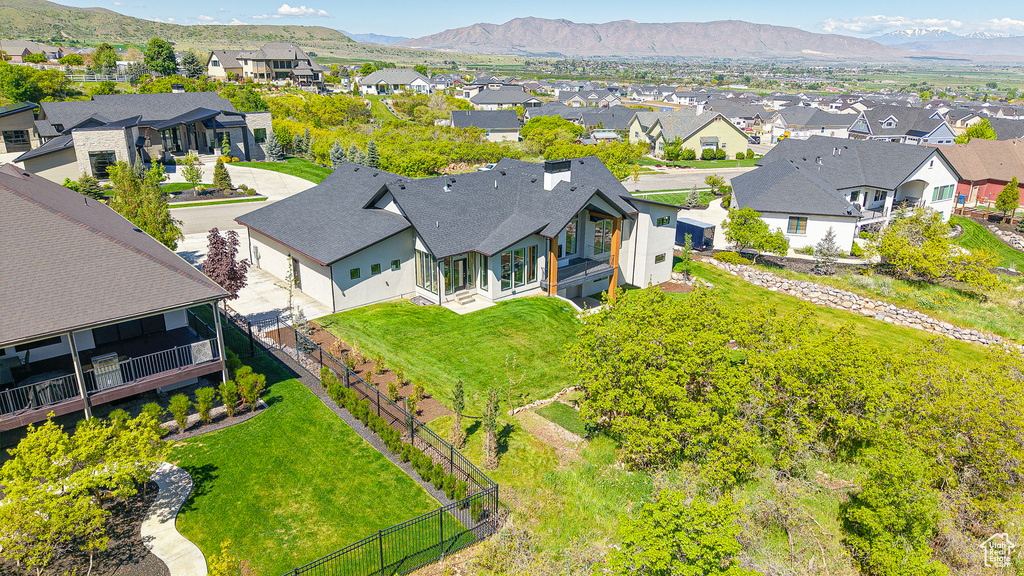 Aerial view of residential area with mountains
