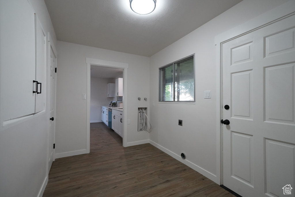 Hallway featuring dark hardwood / wood-style flooring