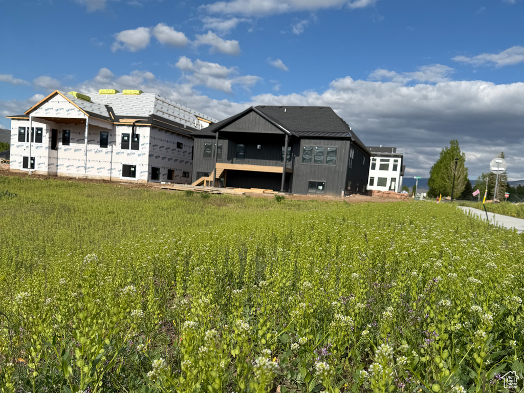 View of yard with agricultural plots and a view of countryside