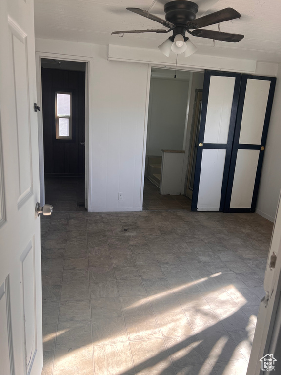 Spare room featuring ceiling fan