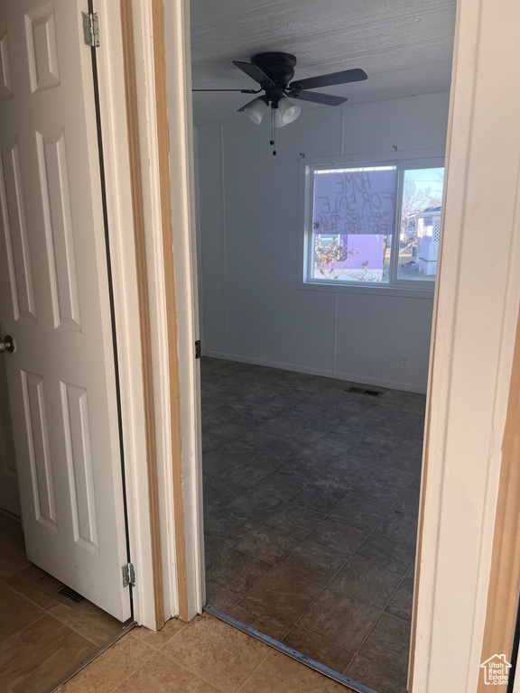 Corridor with tile patterned floors
