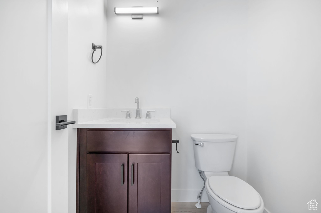 Bathroom with toilet and vanity