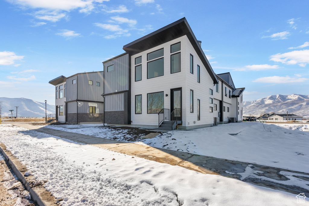 View of front of property featuring a mountain view