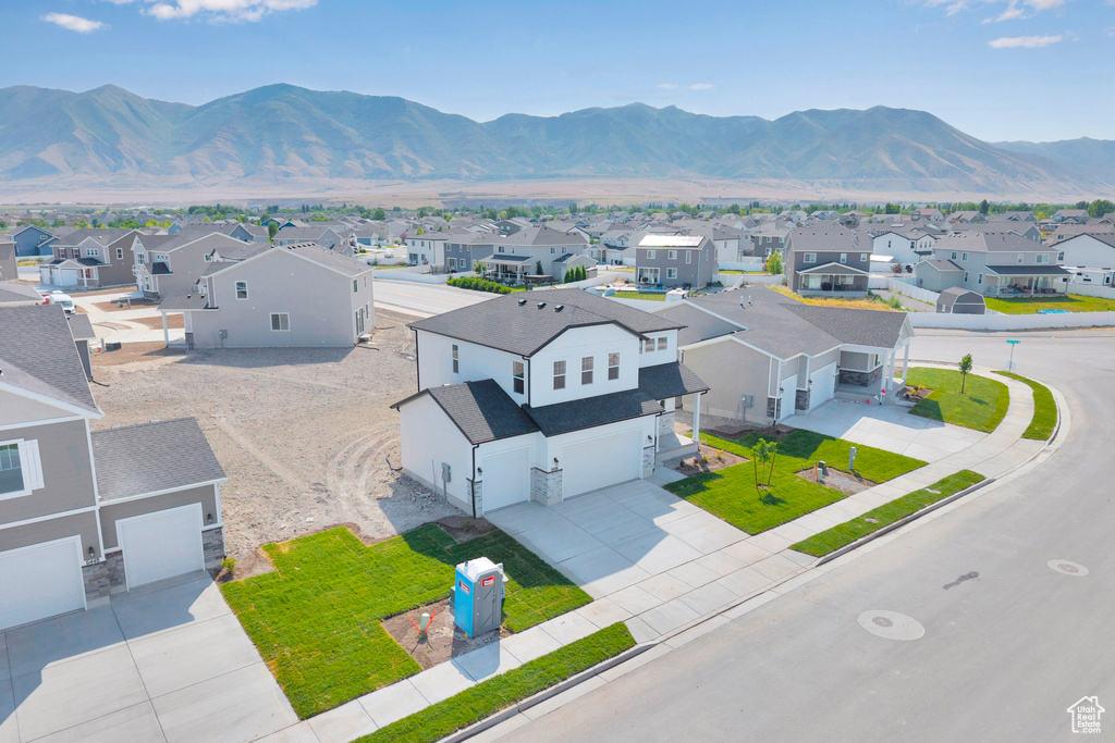 View of mountain backdrop with nearby suburban area