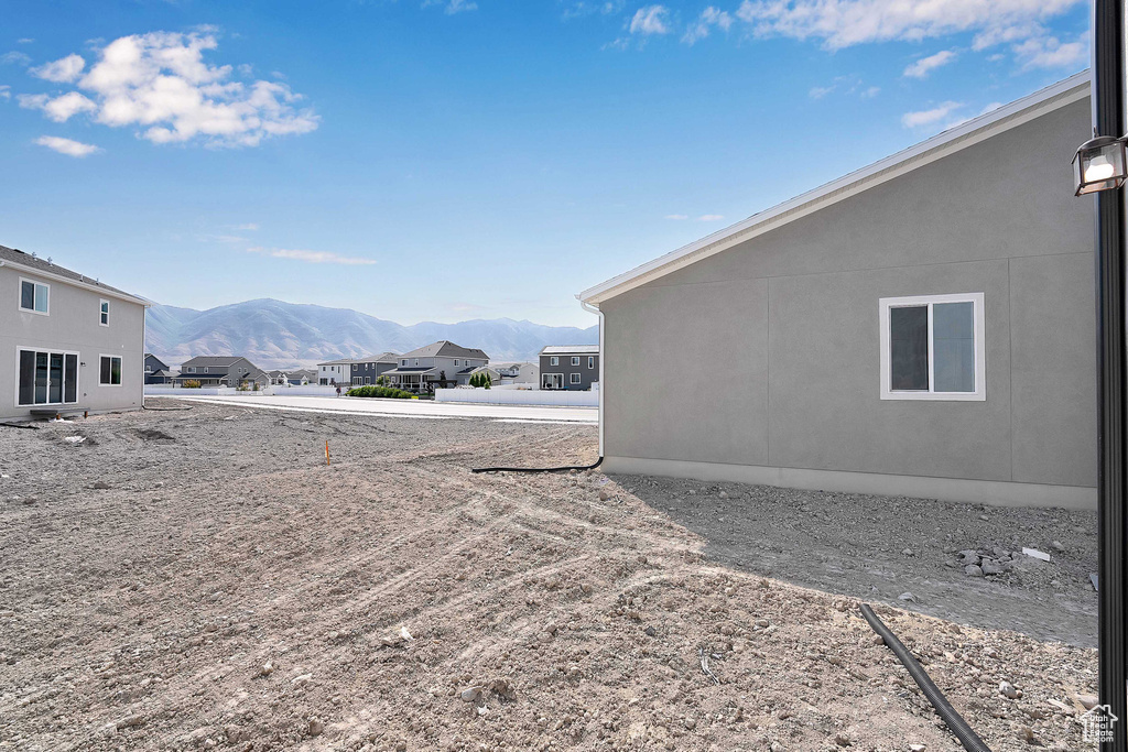 View of yard with a mountain view and a residential view