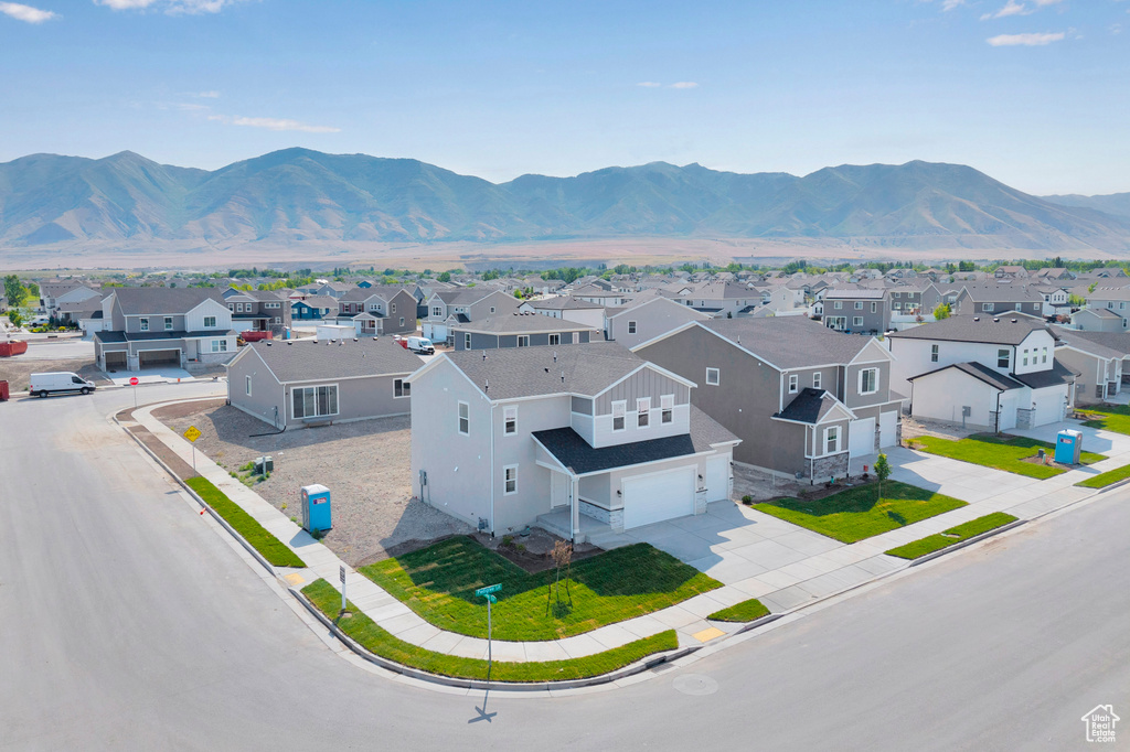 View of mountain background featuring nearby suburban area