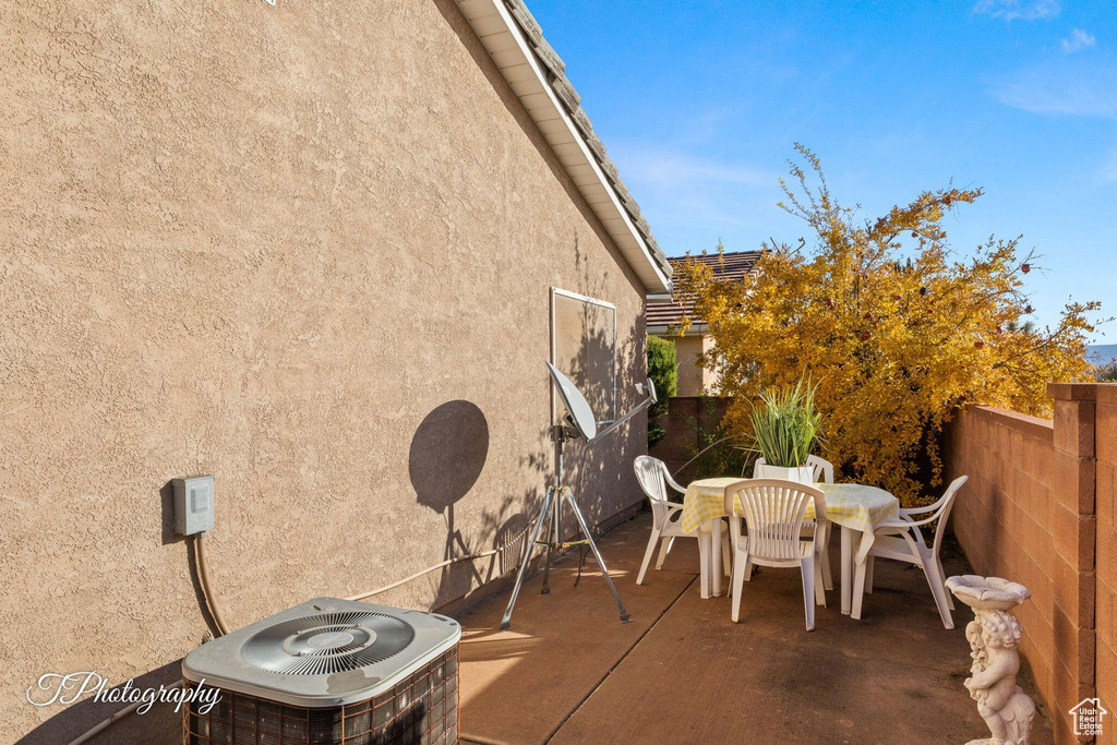 View of patio featuring central AC unit