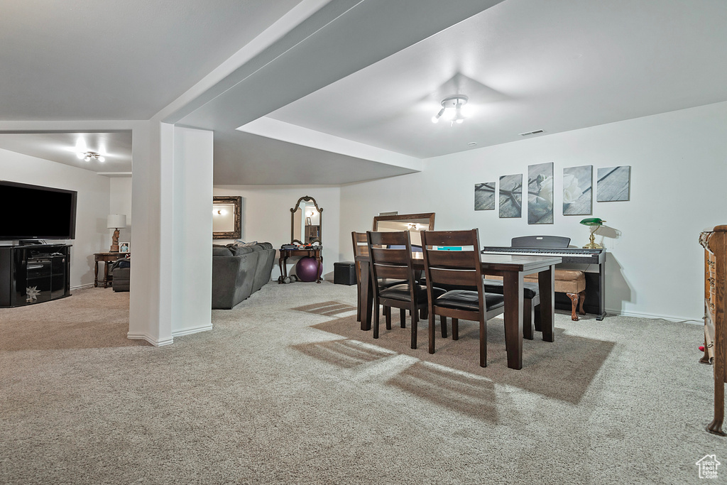 View of carpeted dining space