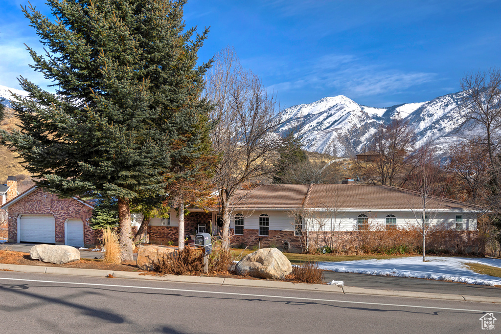 View of front of property featuring a mountain view