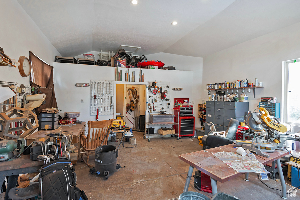 Garage featuring a workshop area