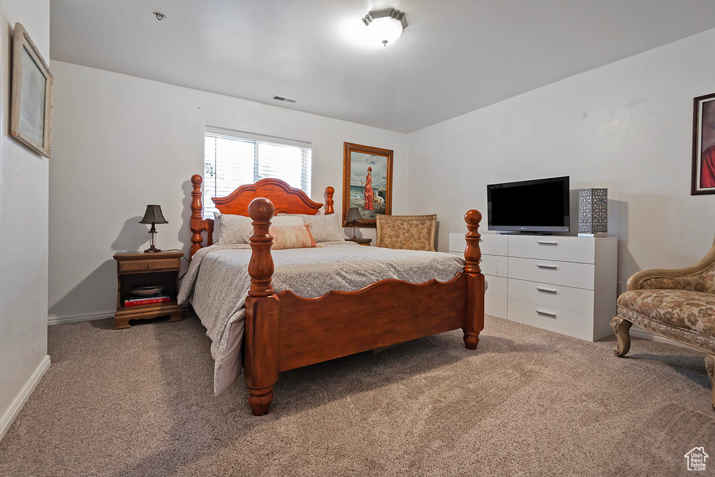 View of carpeted bedroom