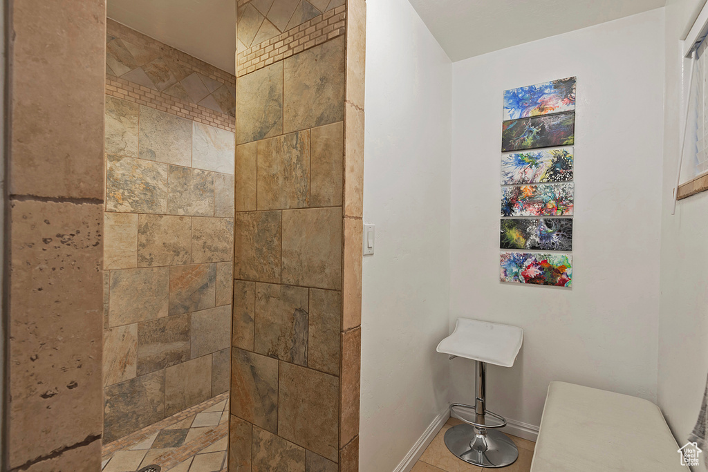 Bathroom with a tile shower