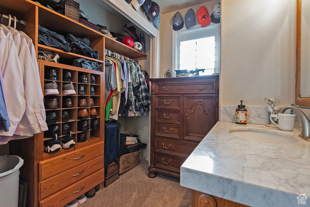 Walk in closet featuring sink