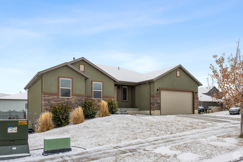 Single story home with a garage