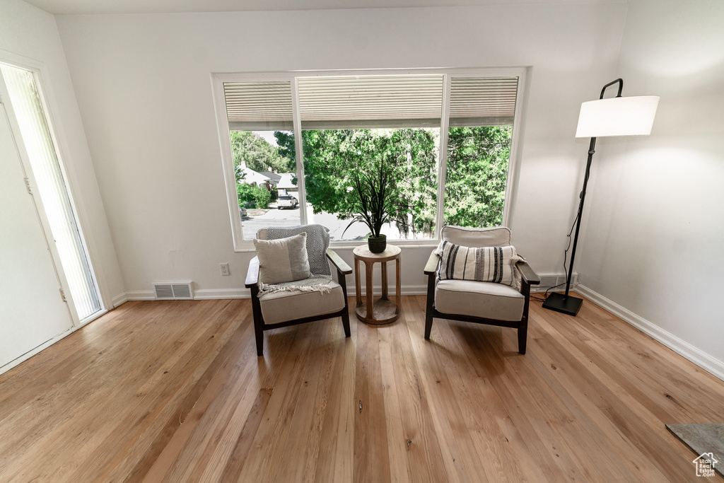 Living area featuring light hardwood / wood-style floors