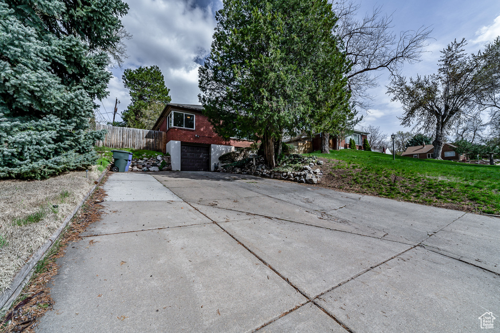 View of front of home featuring a garage