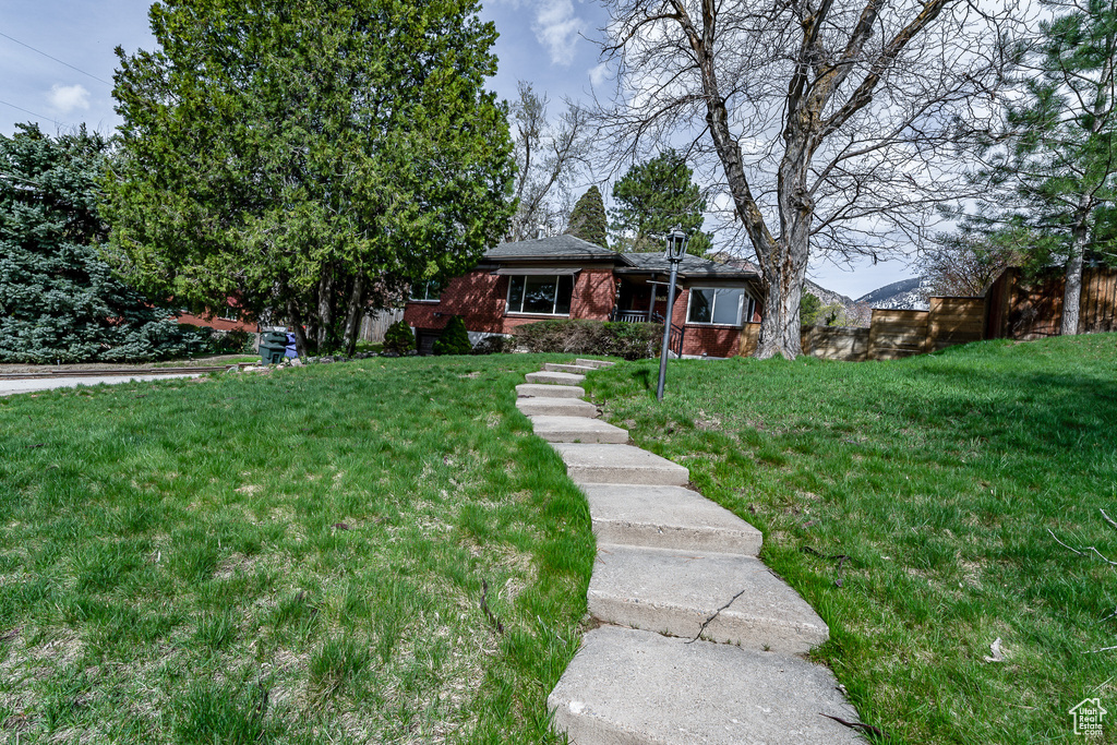 View of front facade with a front yard