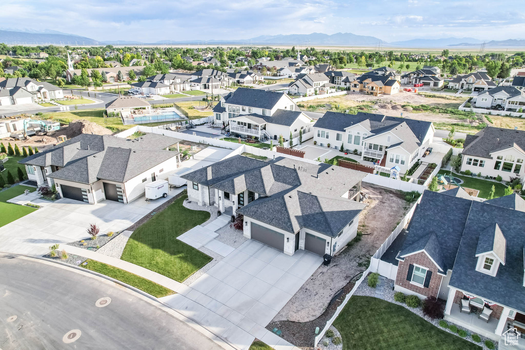 Aerial view of residential area with a mountain backdrop