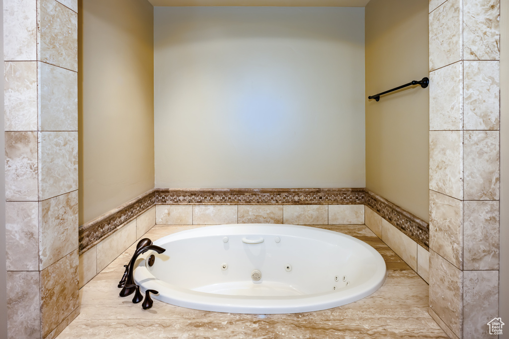Bathroom with a washtub