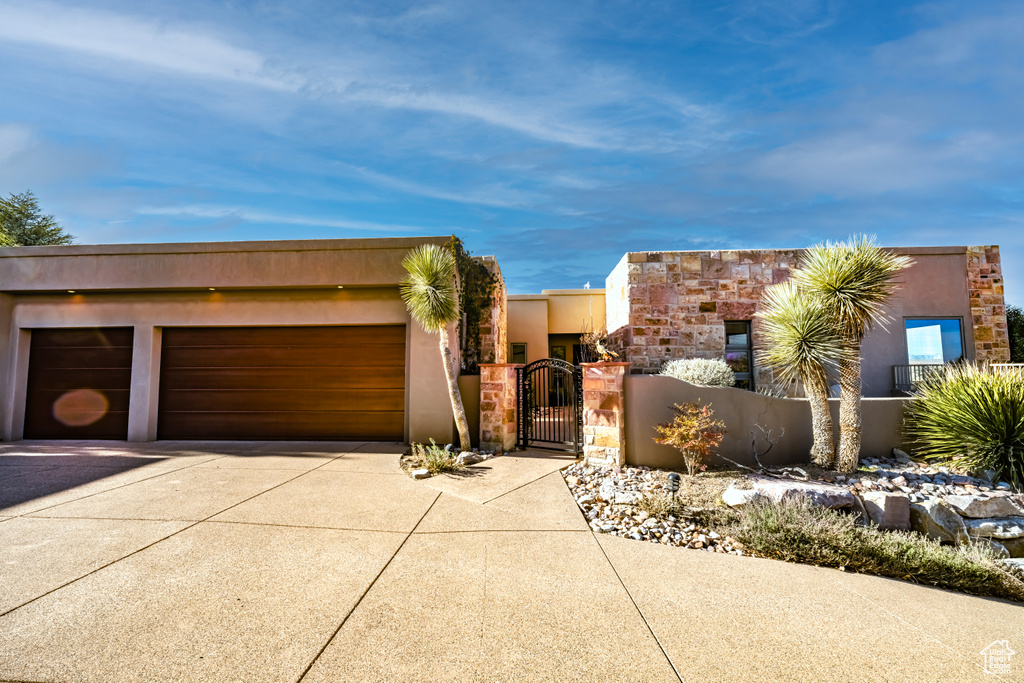 View of front of property with a garage
