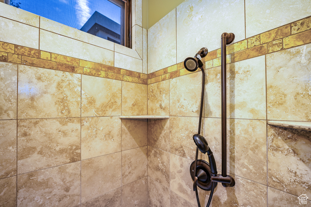 Details featuring tiled shower