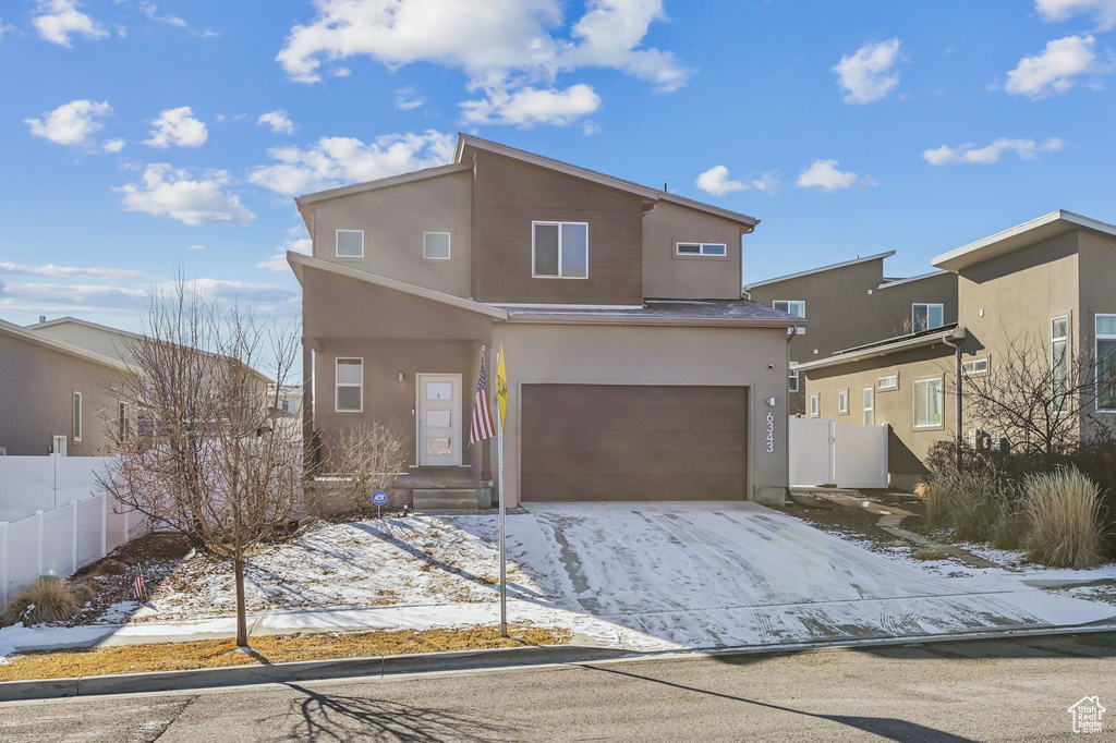 View of front of home with a garage