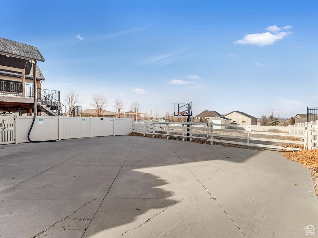 View of patio / terrace featuring basketball court