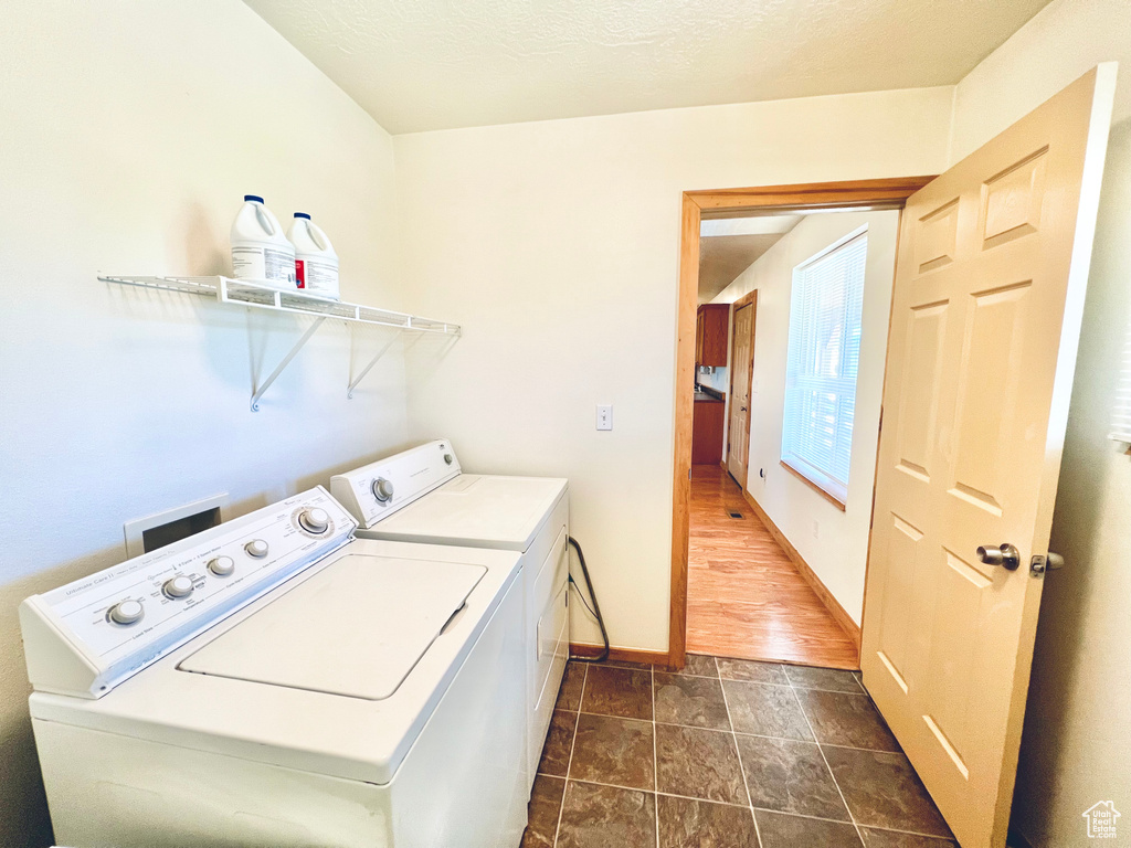 Clothes washing area with washer and clothes dryer