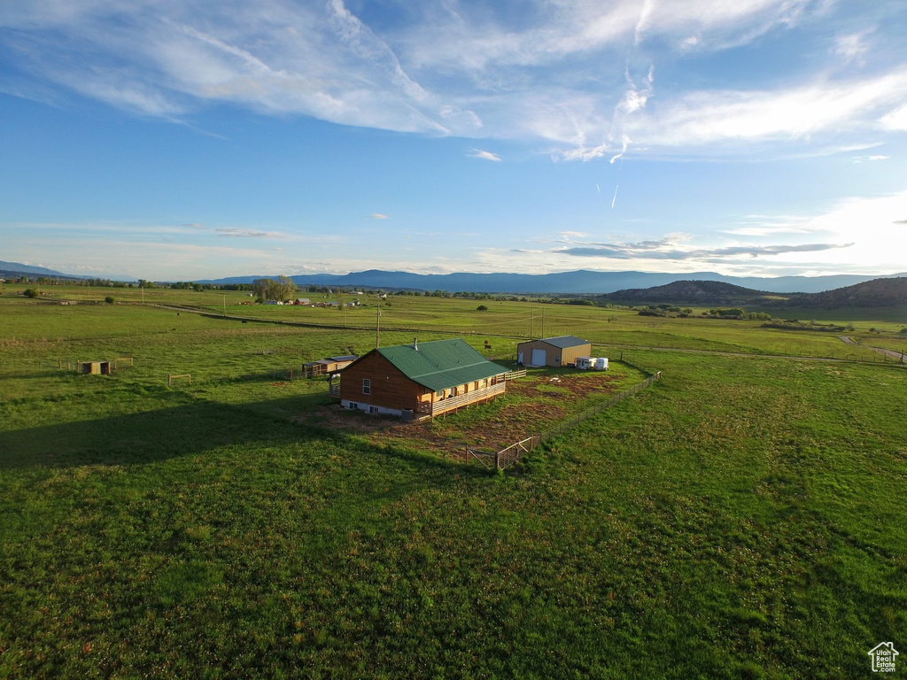 Drone / aerial view with a mountain view and a rural view