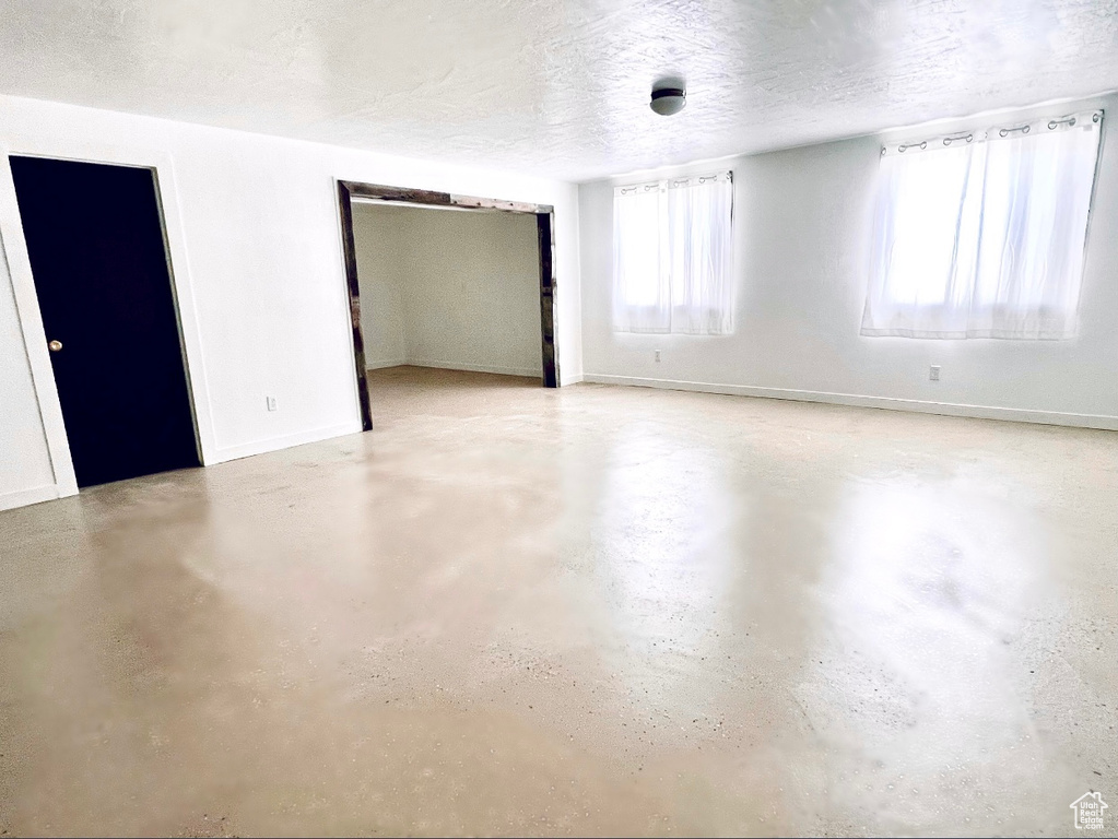 Spare room featuring a textured ceiling