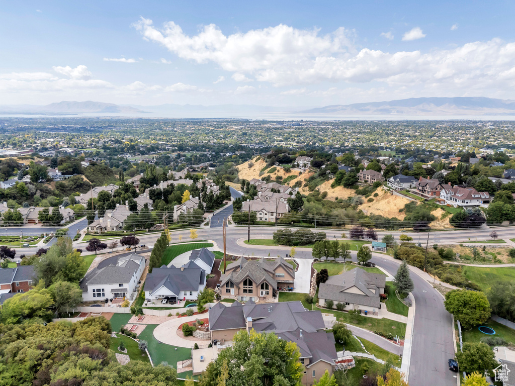 Birds eye view of property with a mountain view