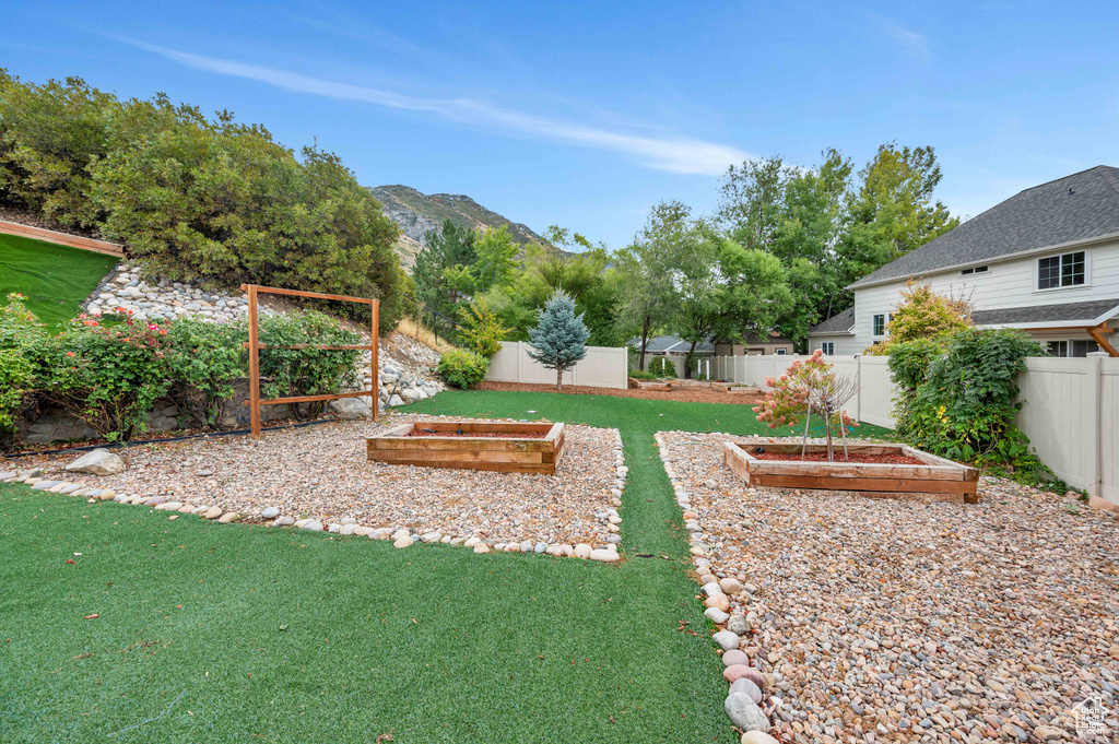 View of yard with a mountain view