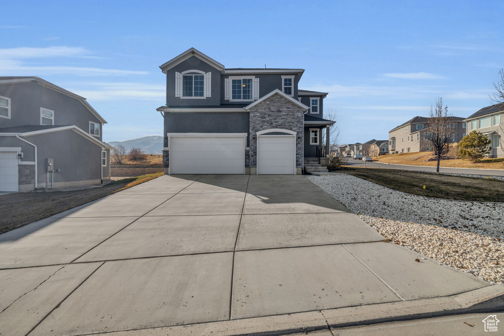 Front of property featuring a garage