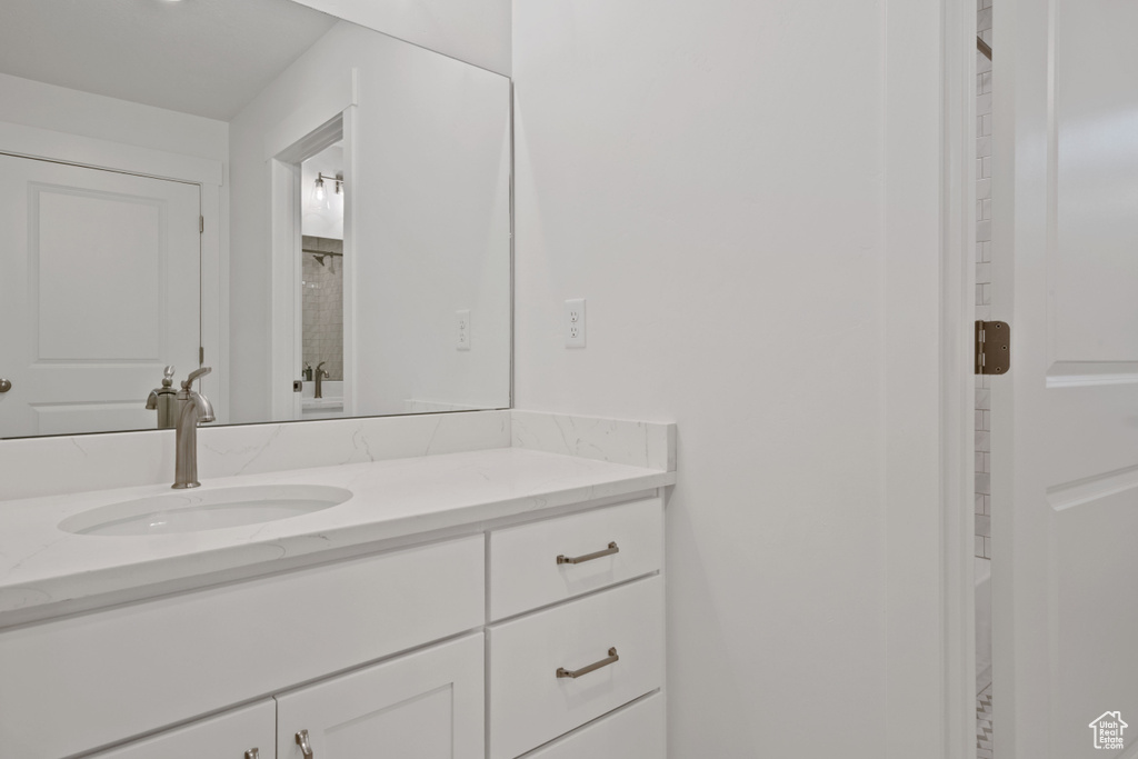 Full bathroom with vanity