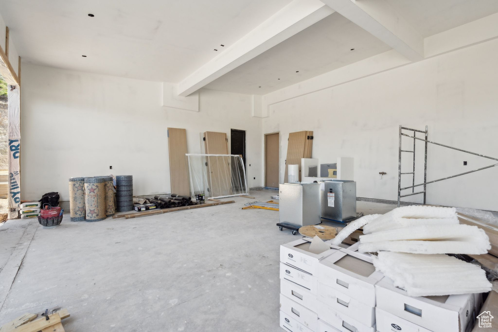 Misc room featuring beam ceiling