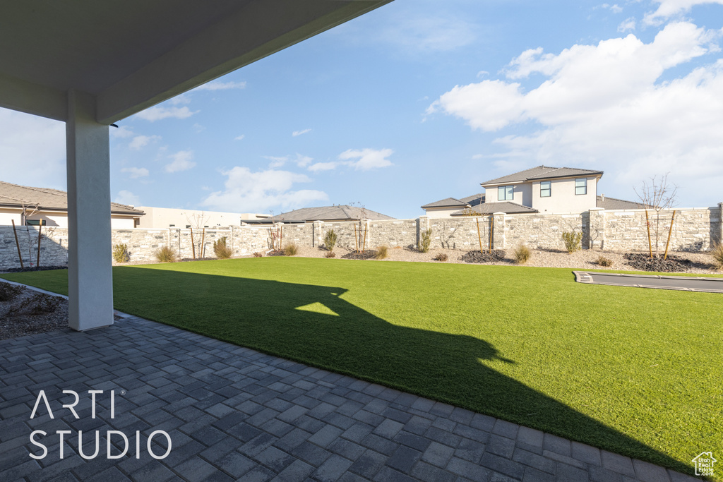 View of yard featuring a patio