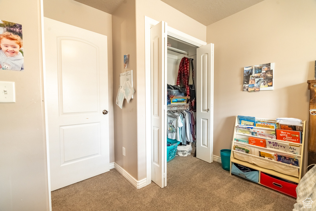Interior space with a closet and baseboards