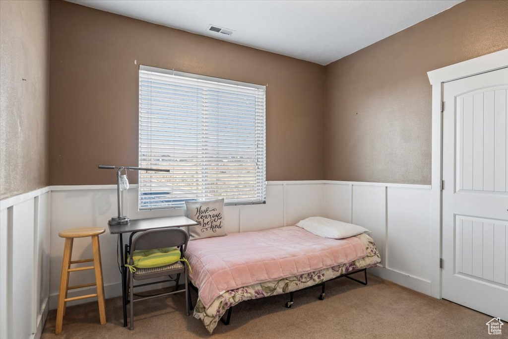 Bedroom featuring carpet floors