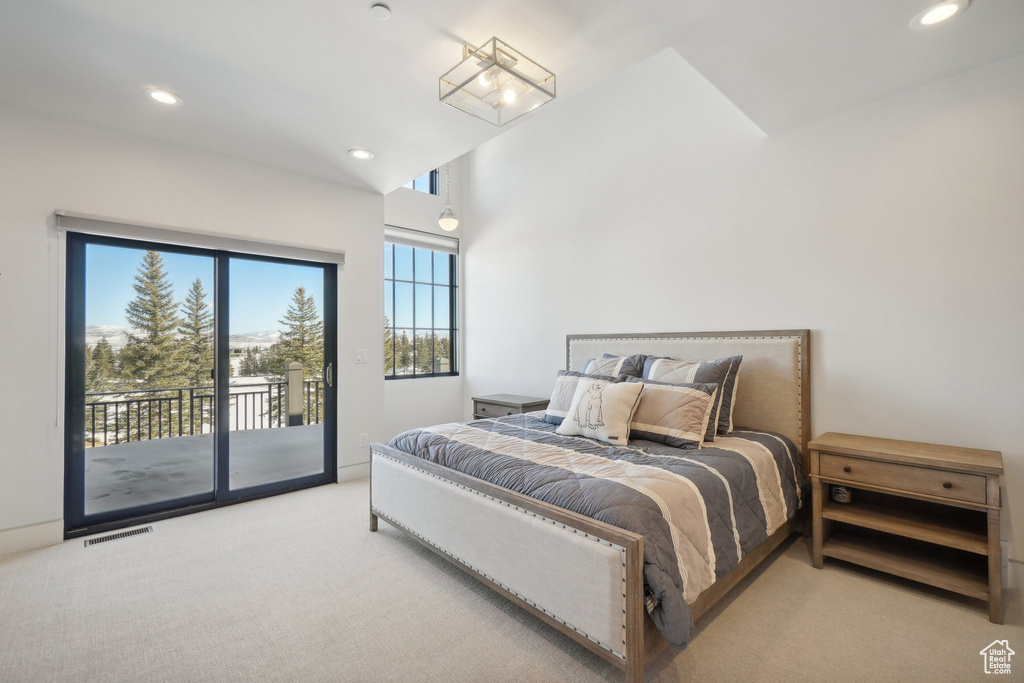 Carpeted bedroom featuring access to exterior and recessed lighting