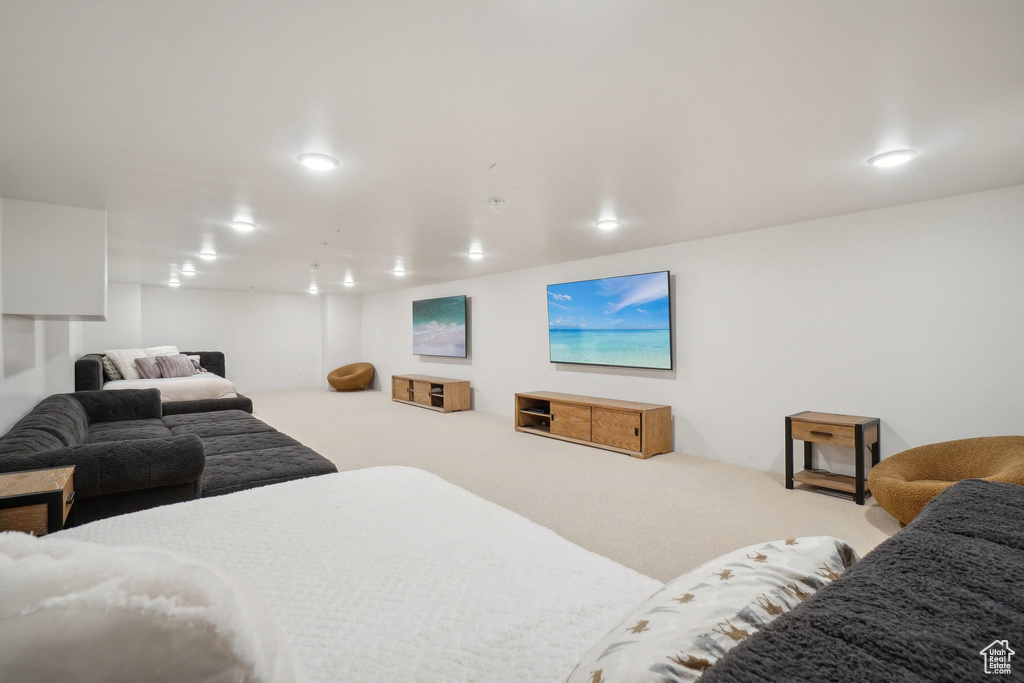 Living room featuring carpet floors and recessed lighting